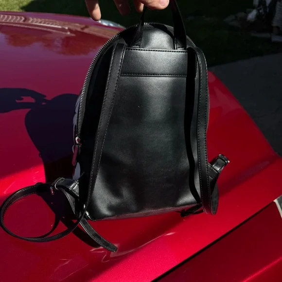 Two Michael Kors backpacks very good condition. Original tags with both bags!